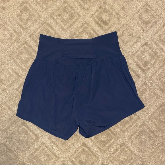 Halara Airy Super High Waisted Cool Touch Yoga Shorts with Pockets in Navy Blue - Picture 2 of 8
